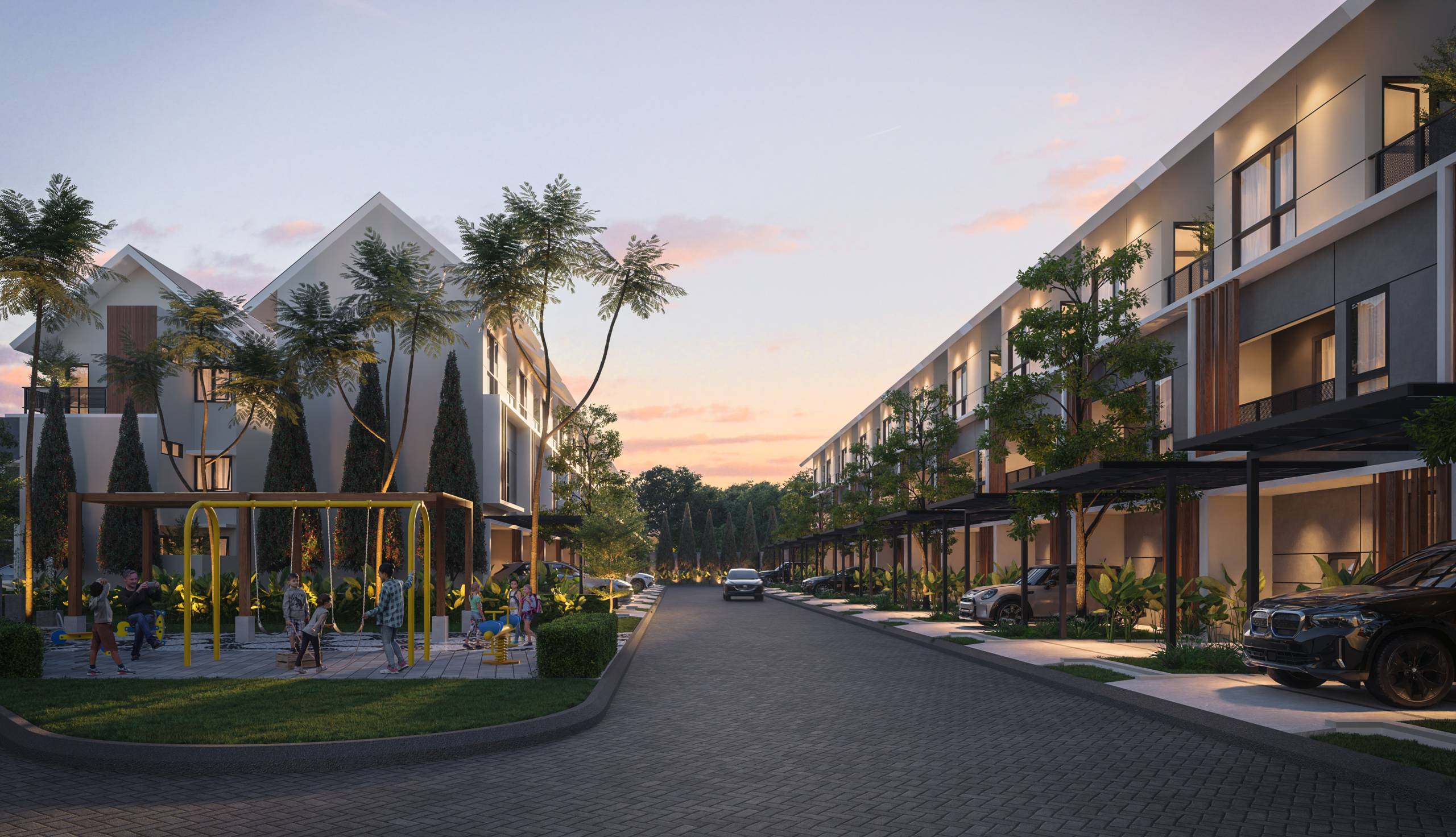 Pemandangan senja yang menenangkan dari jalan perumahan modern di Griya Idola Residence, menampilkan deretan rumah kota dua lantai dengan desain elegan, balkon pribadi, dan area luar bersama yang terlandskap baik dengan pejalan kaki yang menikmati ruang tersebut